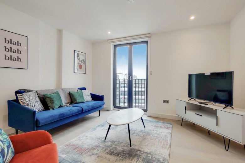 Modern and airy living room, filled with natural light and stylish decor